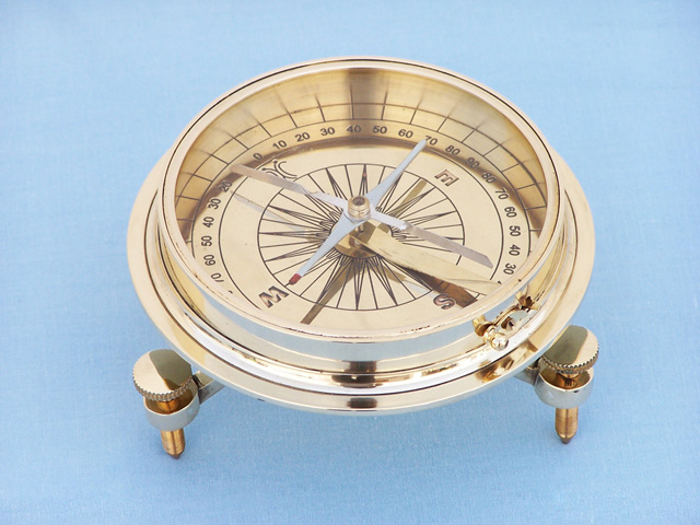 Brass  compass on 3 legs 