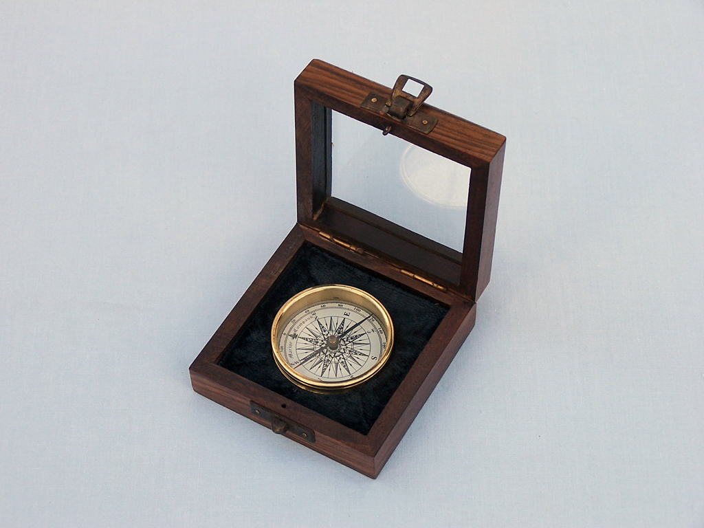 Compass in glass lid box