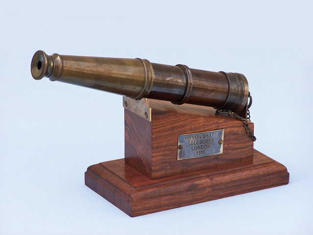 Brass folding telescope on wood stand