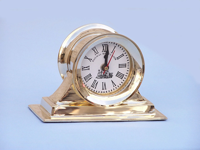 Brass watch on base