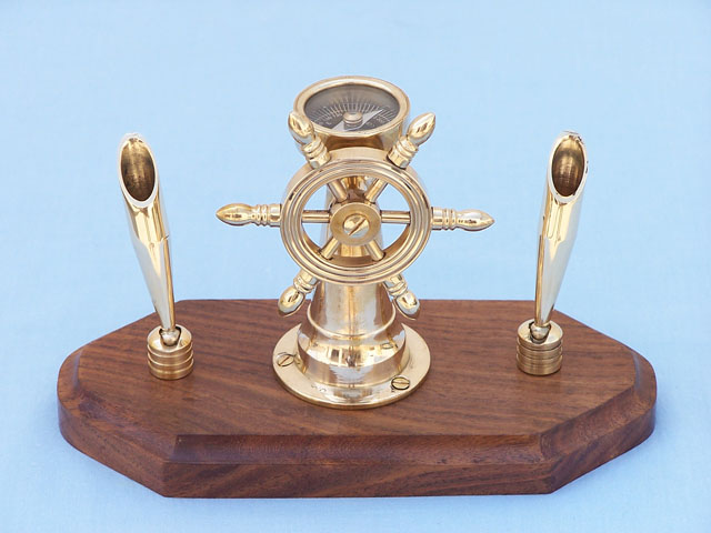 Pen holder with brass steering compass