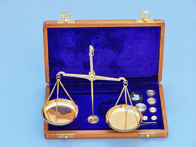 Scale in wooden polished box 