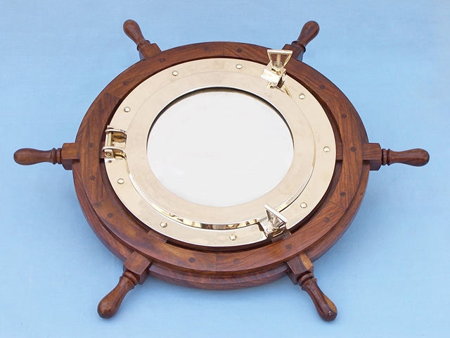 wooden ship and boat steering wheel with porthole mirror